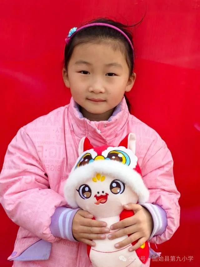 南宫NG·28(中国)官方网站固始县第九小学：瑞蛇携福至 福韵伴童行(图1)