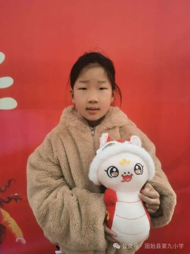 南宫NG·28(中国)官方网站固始县第九小学：瑞蛇携福至 福韵伴童行(图2)